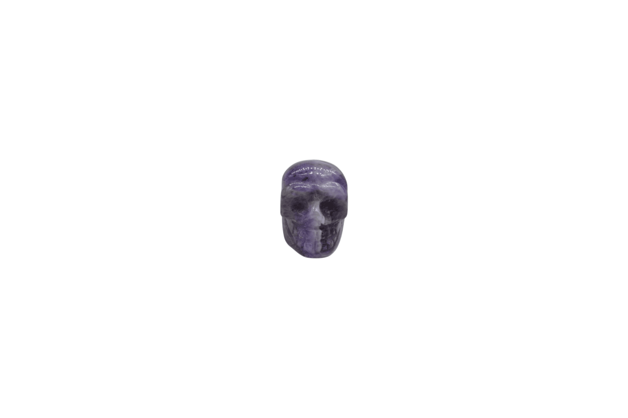 Dije en forma de calavera de cuarzo amatista