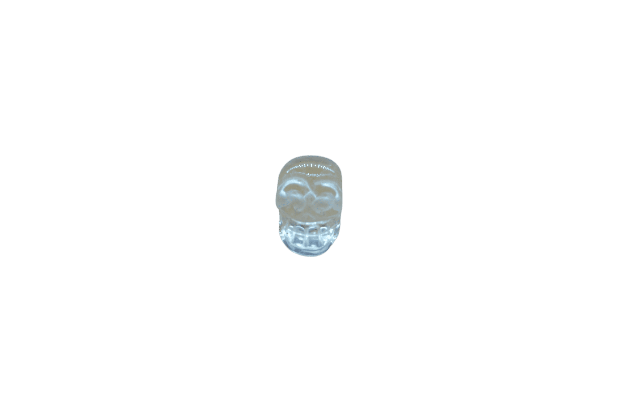 Dije en forma de calavera de cuarzo cristal