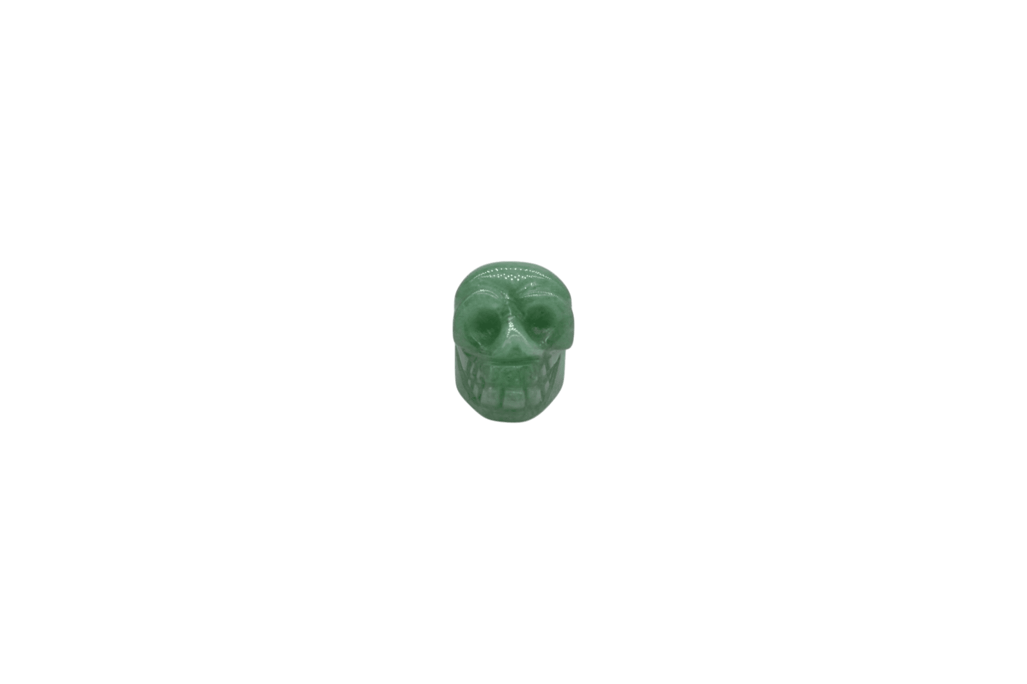 Dije en forma de calavera de cuarzo verde