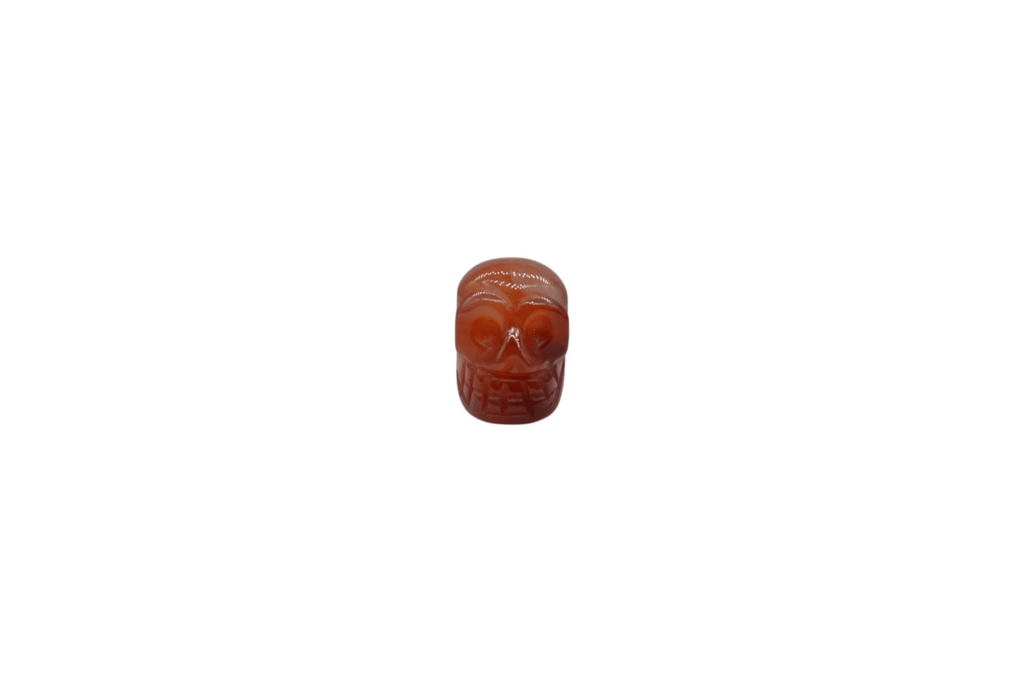 Dije en forma de calavera de piedra ágata cornalina