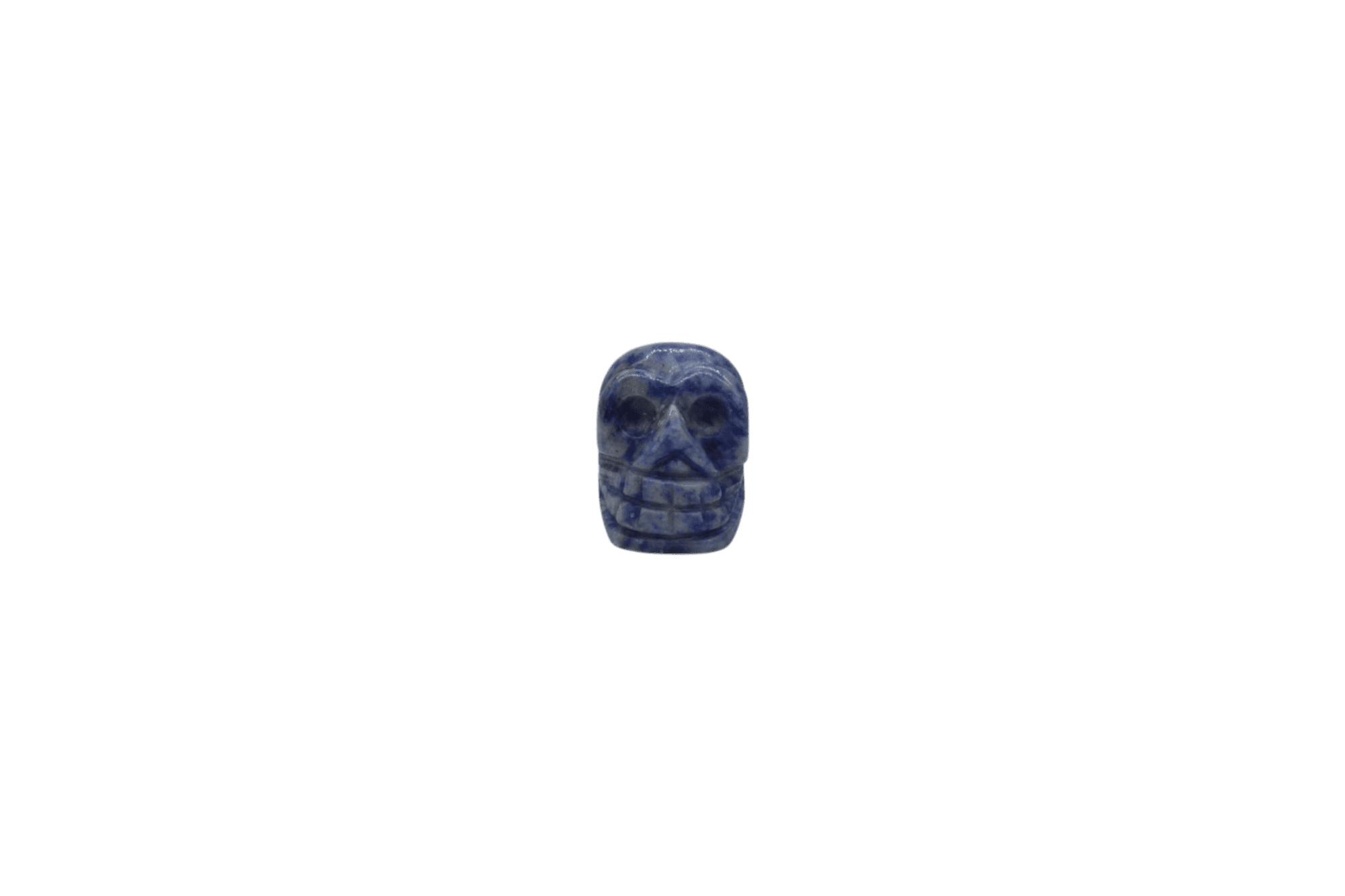 Dije en forma de calavera de piedra sodalita